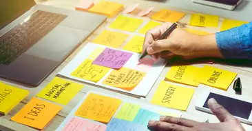 businessman working with notepaper of strategy ideas.Business co