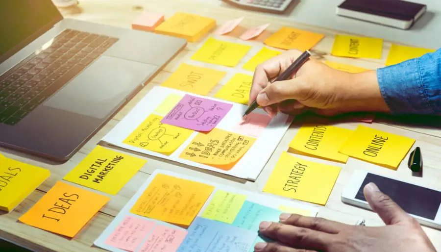 businessman working with notepaper of strategy ideas.Business co